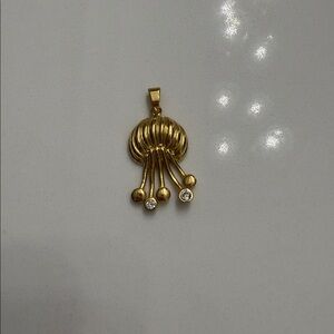 Elegant Gold Pendant with Crystal Accents